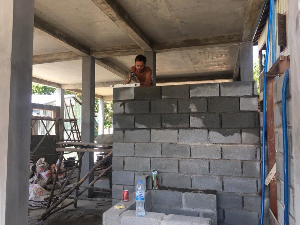 Phil on the tools, early in his construction career.